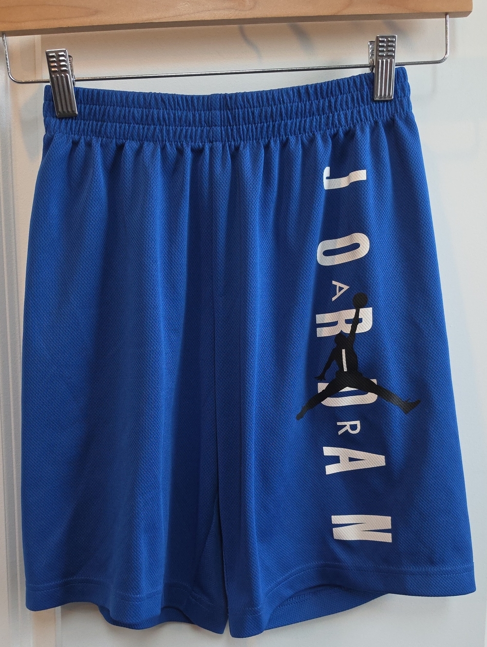 Jordan Blue Athletic Shorts with Black Jumpman and White Lettering